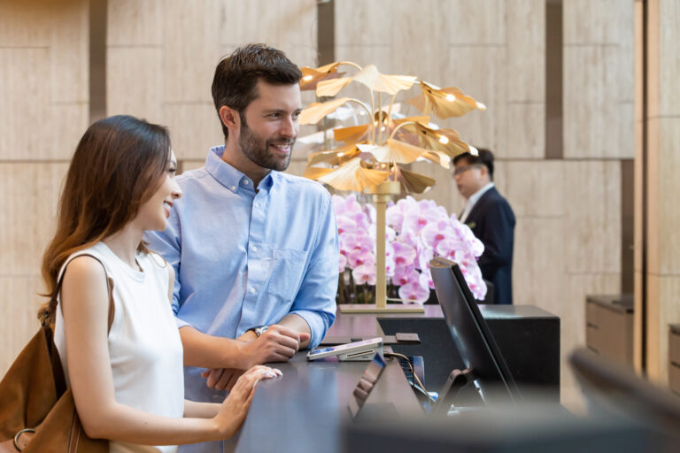 dusit-thani-laguna-singapore-lobby-lifestyle-couple-check-in
