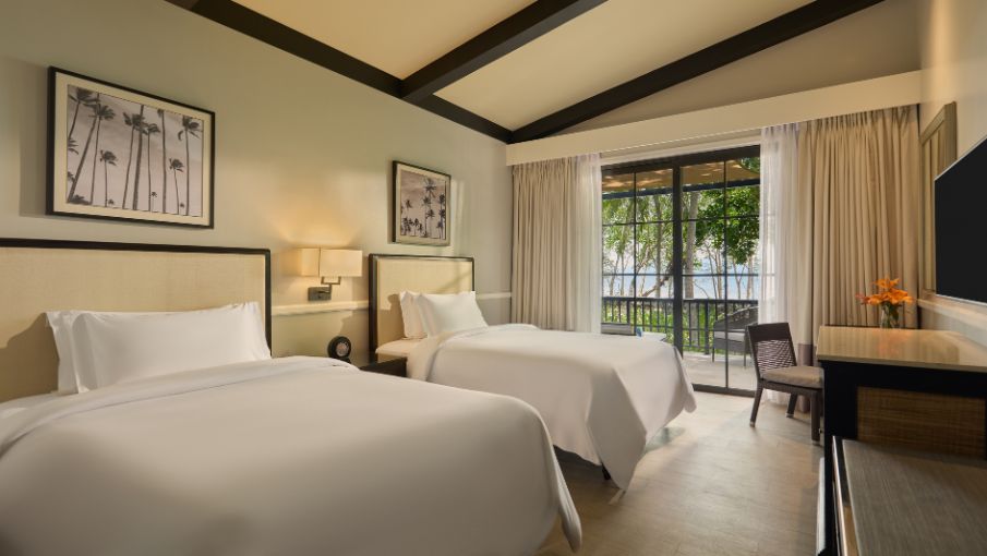dusit-thani-lubi-plantation-accommodation-premier-twin-ocean-balcony-bedroom